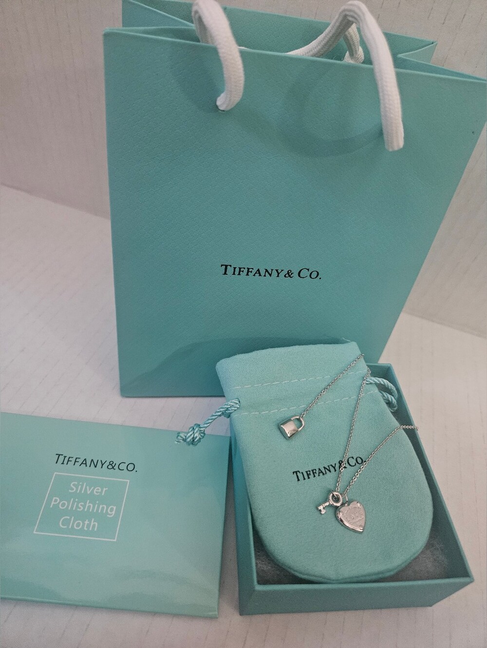Sterling Silver Heart and Key Pendant Necklace with Blue Pouch
